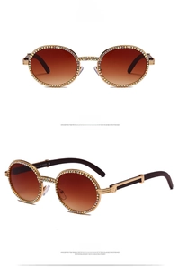 Detail of round rhinestone sunglasses with tea-colored lenses and UV400 CE marking