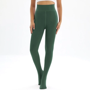 Detail of high waist ribbed waistband on thick dark green thermal fleece lined leggings