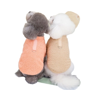 Plush warm dog vest with metal D-ring leash attachment in pink and beige fleece
