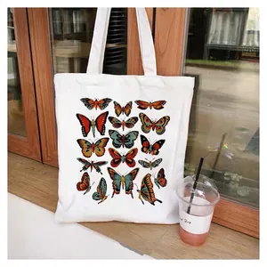 Canvas tote bag with vintage colorful butterfly prints and dual shoulder straps