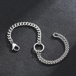 Detailed macro view of the silver stainless steel Cuban and link chain toggle bracelet
