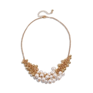 Vintage baroque necklace with imitation pearls and gold beads on a gold chain