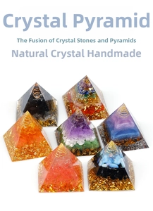 Detailed top view of handmade orgonite energy pyramids with healing crystal stones