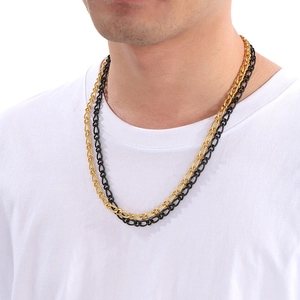 Dual layer stainless steel chain necklaces in gold and black for men on model
