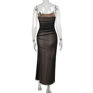 Detailed back view of slim fit black mesh dress featuring elegant ruched texture design