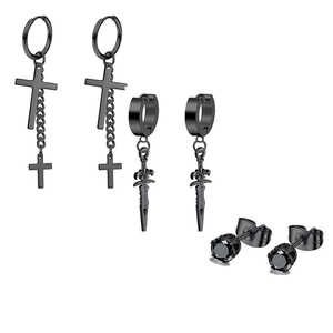 Detail view of 3 pairs black punk earrings set with cross, dagger and zircon studs