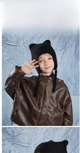 Detail of kids knit cat ear hat in soft faux mink fur for winter warmth and comfort