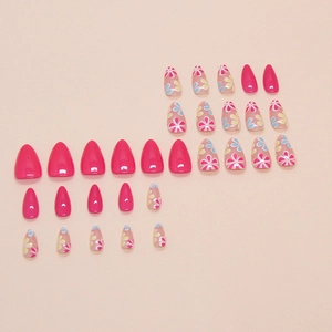 Glossy almond-shaped press-on nails with pink solid color and floral patterns