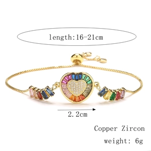 Detail of rainbow zircon heart bracelet with adjustable gold copper chain and sizing info