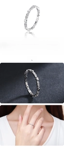 Detail view of 925 sterling silver ring with cubic zirconia and heart motifs