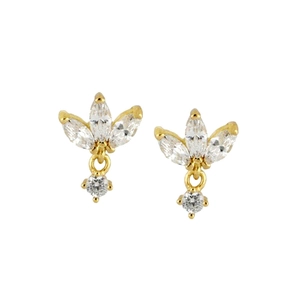 Close-up of gold-plated clover earrings with clear zircon stones on a white background