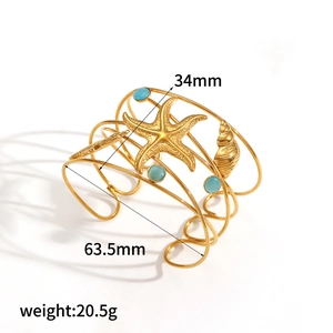 Detail shot of ocean star cuff bracelet with dimensions 34mm width and 63.5mm diameter