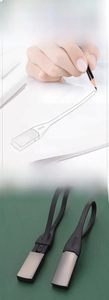 Zinc alloy keychain with black silicone strap designed by Aurelien Barbry for Menu