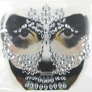 Detail of skull face rhinestone stickers for Halloween featuring clear pear-shaped gems