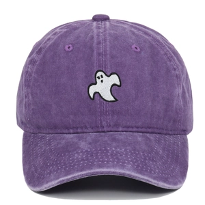 Close-up of white ghost embroidery on a washed purple cotton baseball cap fabric