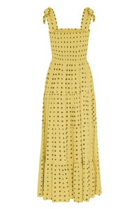 Detail of yellow checkered tiered maxi dress with bow straps and smocked bodice