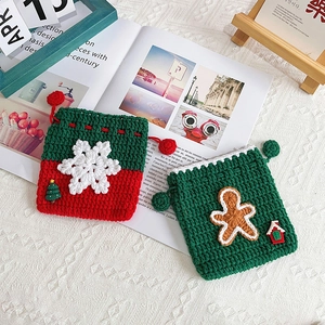 Handmade crochet Christmas drawstring gift bags with snowflake and gingerbread man charms