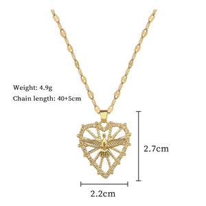 Detail of gold heart pendant with phoenix relief, dimensions 2.7cm and weight 4.9g
