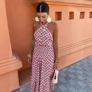 Halter neck backless maxi dress with red and white geometric print for summer vacations
