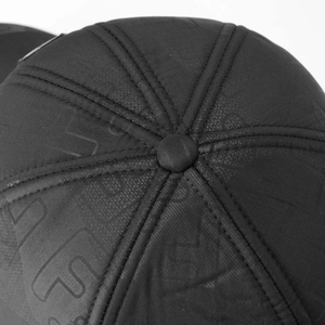 Detailed top view of the black winter baseball cap featuring textured fabric and stitching