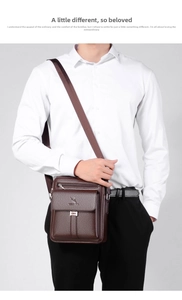 Detail of vintage brown leather cross-body bag with pebble texture and metal buckle clasp