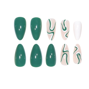 Green and white almond press-on nails with abstract swirl designs, 10-piece set