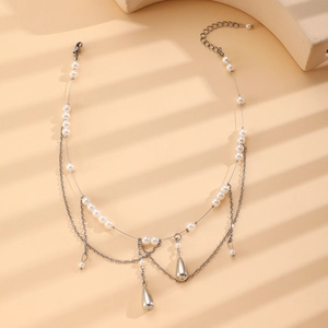 Double-layer pearl choker necklace with silver water drop pendants and elegant fringe