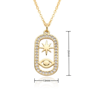 Detail view of gold necklace pendant with evil eye and star motif dimensions 26mm by 13mm