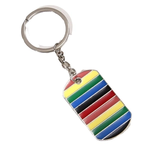 Vintage metal shield keychain featuring South African flag colors on a white background