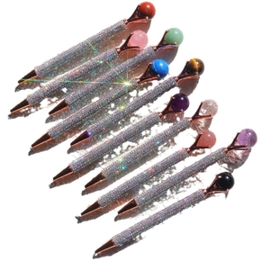 Sparkly silver glitter ballpoint pens with colorful crystal gem tops in rose gold finish