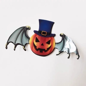 3D Halloween decoration featuring a pumpkin head with bat wings and a blue top hat