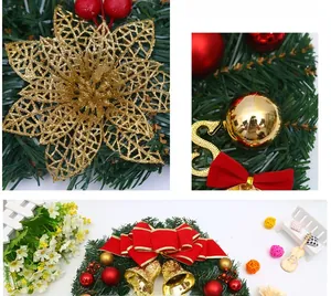 Macro detail of Christmas wreath with golden bells, red velvet bow, and pine needles