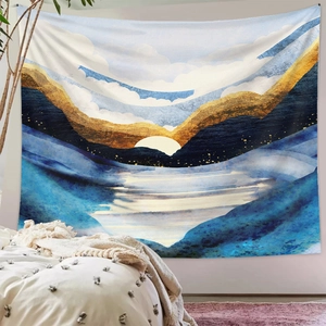Detailed view of an abstract mountain tapestry with gold lines on a grey wall