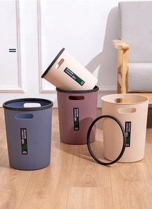Detailed view of colorful plastic bins with press rings and built-in side handles