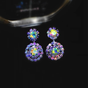 Sparkling snowflake rhinestone earrings with iridescent AB color in a double round dangle design