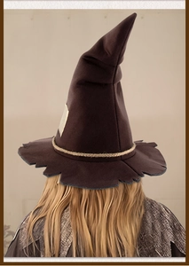 Rear view of brown pointed wizard hat with rustic jute rope detail and jagged edges