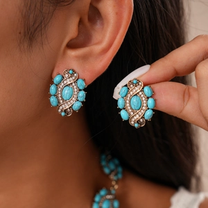 Boucles d'oreilles bohèmes vintage avec pierres turquoise et cristaux sur base bronze