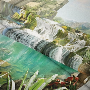 Close-up of high-quality woven fabric showing natural waterfall and mountain landscape detail
