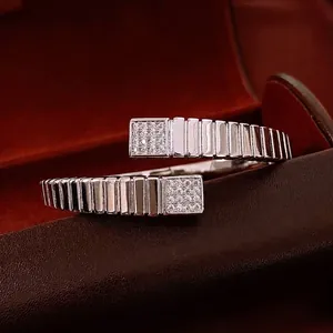 Silver square cuff bracelet with wave texture and sparkling micro-pave zircons