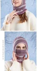 Detail showing the purple striped knit texture and warm plush lining of the balaclava hood