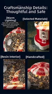 Detail of Santa Claus snow globe music box with LED lights and resin craftsmanship