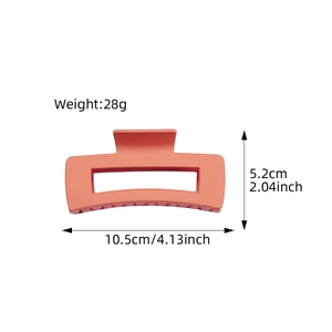 Matte pink hollow rectangular hair claw clip measuring 10.5cm and weighing 28g