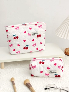 Quilted cotton cosmetic bags in two sizes featuring cherry and butterfly patterns