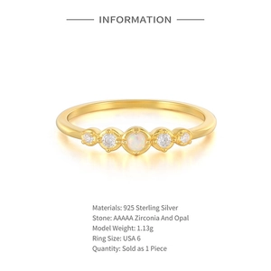 Detailed spec sheet showing 925 silver gold-plated ring with opal and zirconia stones
