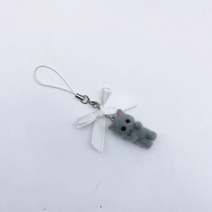 Close-up of a grey flocked cat charm with a white ribbon bow and durable phone lanyard