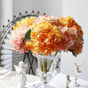 Vintage burnt-edge hydrangea in a glass vase for home and wedding decor