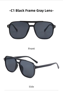 Detail view of retro pilot sunglasses with black double-bridge frames and gray lenses