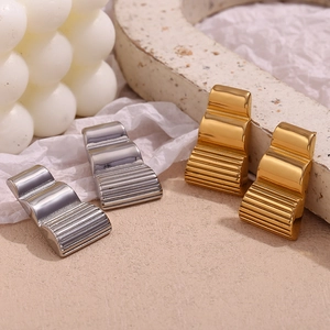 Vintage style wave textured geometric stud earrings in gold and silver stainless steel