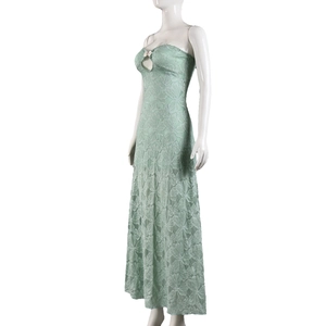 Detail of light green lace tube maxi dress featuring chest cutout and slim fit texture