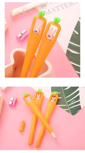 Detail of carrot shaped gel pen with cute rabbit figurine inside the hollow window